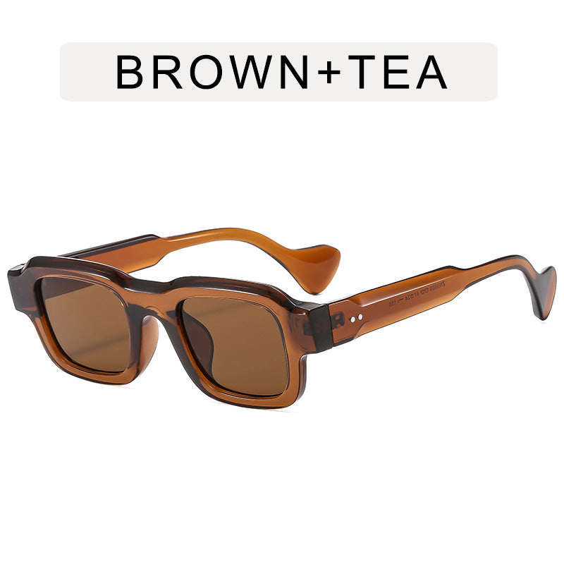 A woman wearing retro small square frames and simple sunglasses